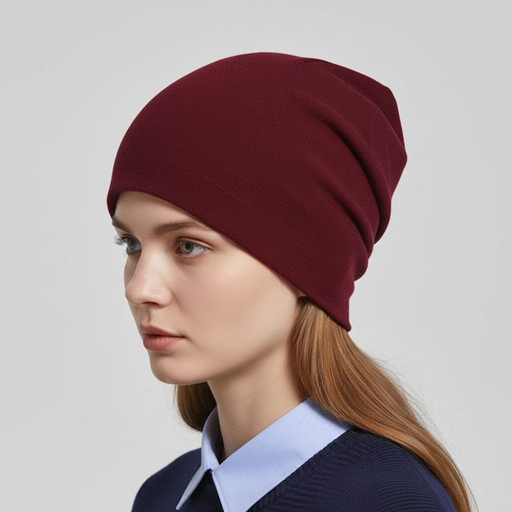 Folded beige wool slouchy beanie, highlighting the quality Australian wool and versatile design