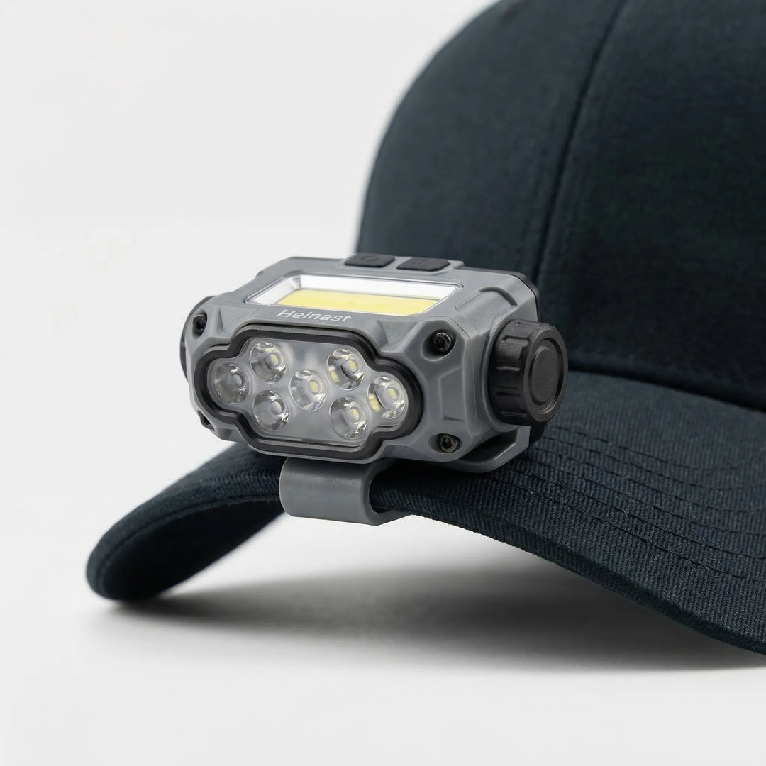 Rechargeable LED clip light with smart sensor. Essential outdoor gear for camping, fishing, and hiking.