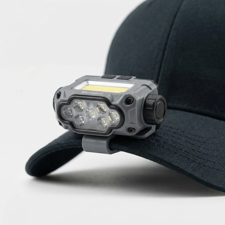 Rechargeable LED clip light with smart sensor. Essential outdoor gear for camping, fishing, and hiking.