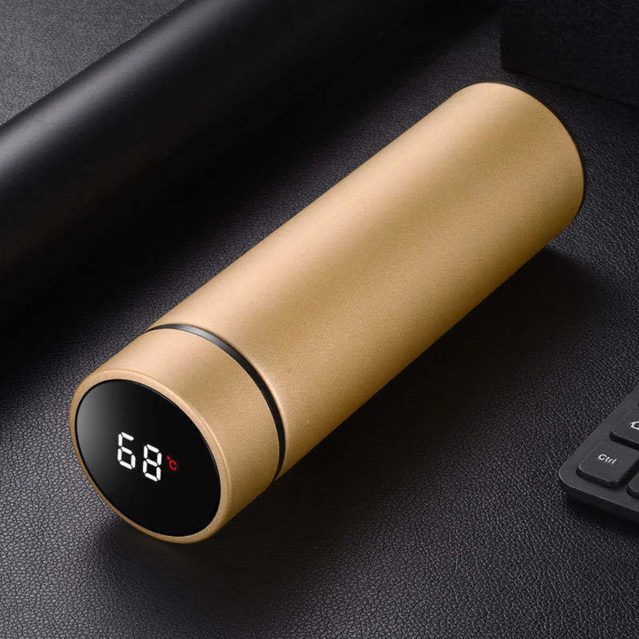 Insulated stainless steel thermos flask keeping hot tea warm, ideal for daily hydration & portable use.