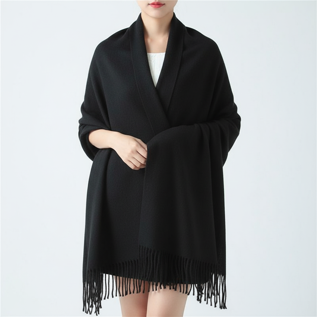 A stack of colorful cashmere unisex scarves, each with the elegant diamond pattern, perfect for gifting.