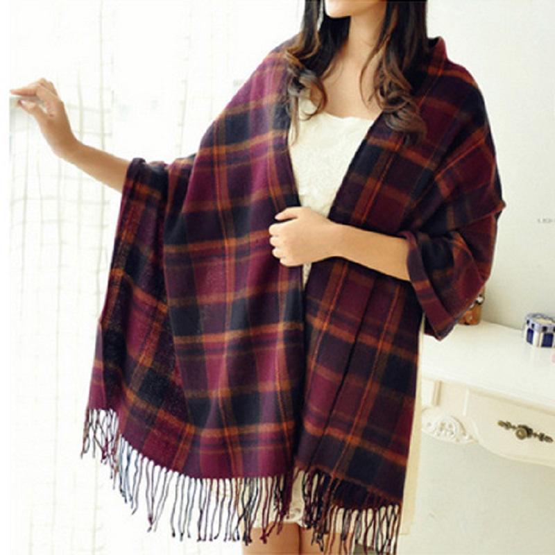 Folded unisex cashmere scarf with clear diamond pattern, ready to wear, a stylish winter accessory.
