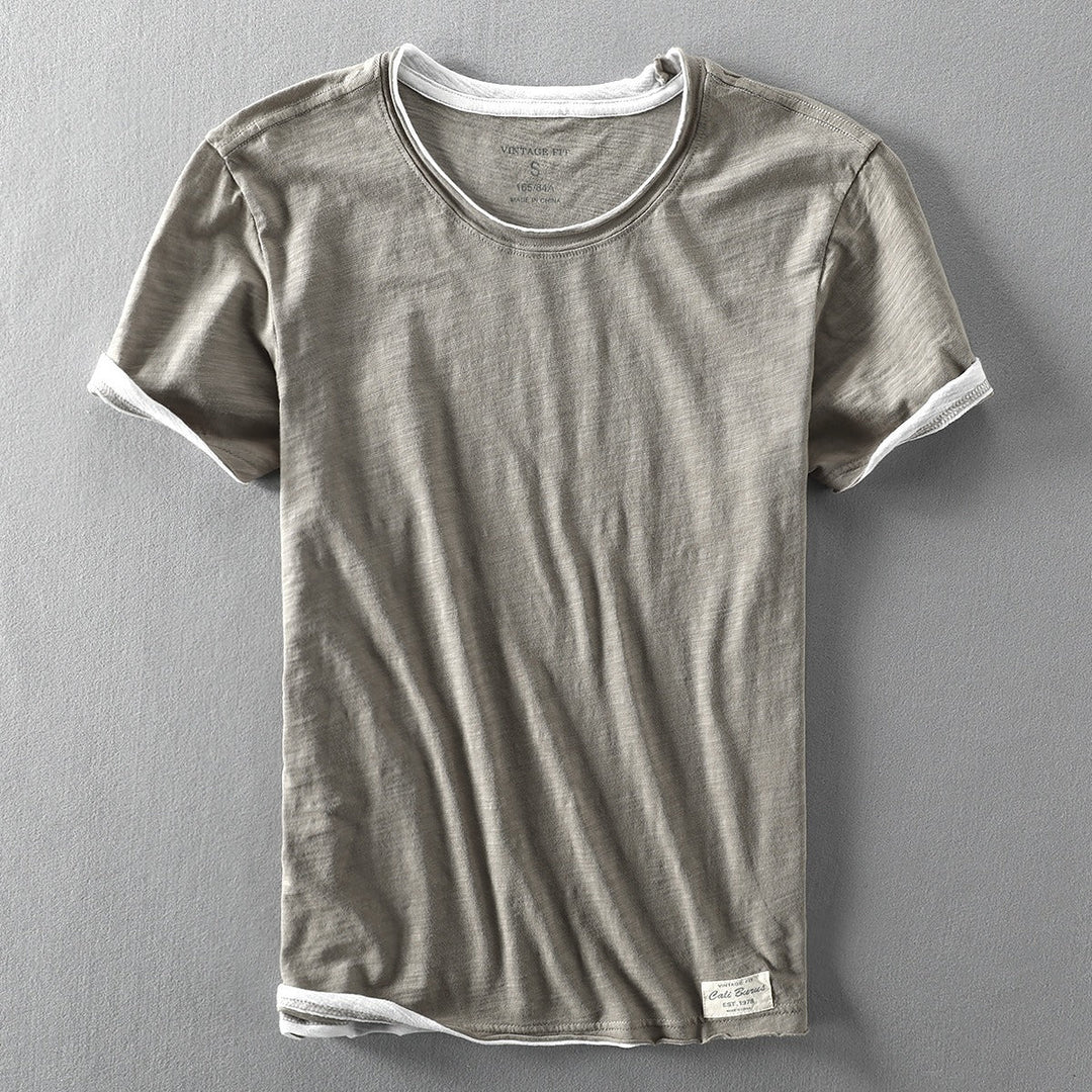 Close-up of a soft vintage slub cotton dual-layer crewneck tee, highlighting its unique texture.