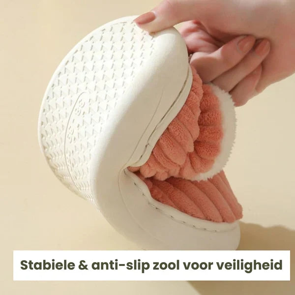 Comfortable unisex non-slip home slippers, providing warmth and softness for indoor relaxation.