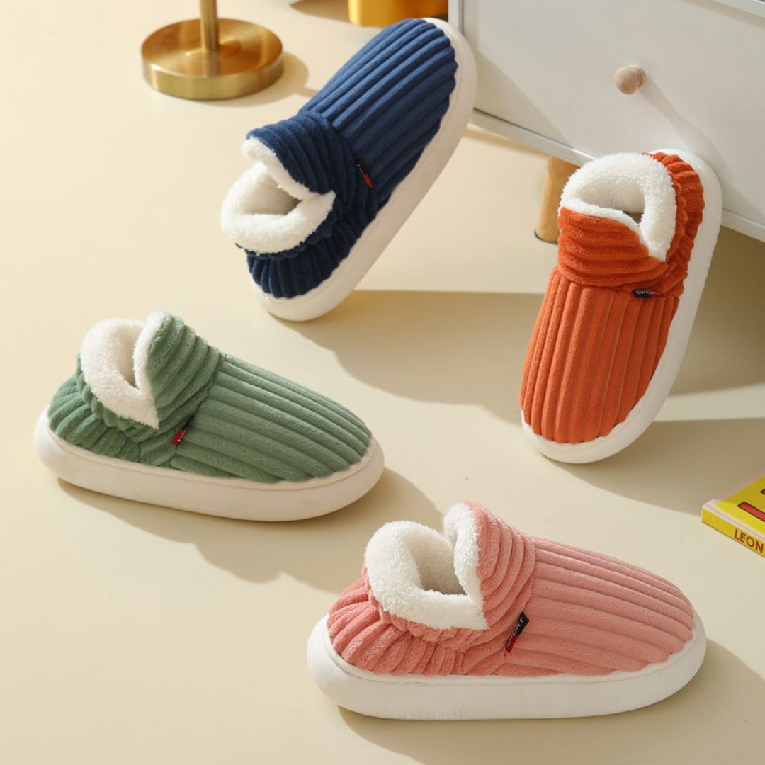 Warm and cozy indoor slippers, plush unisex footwear with non-slip grip for ultimate comfort.
