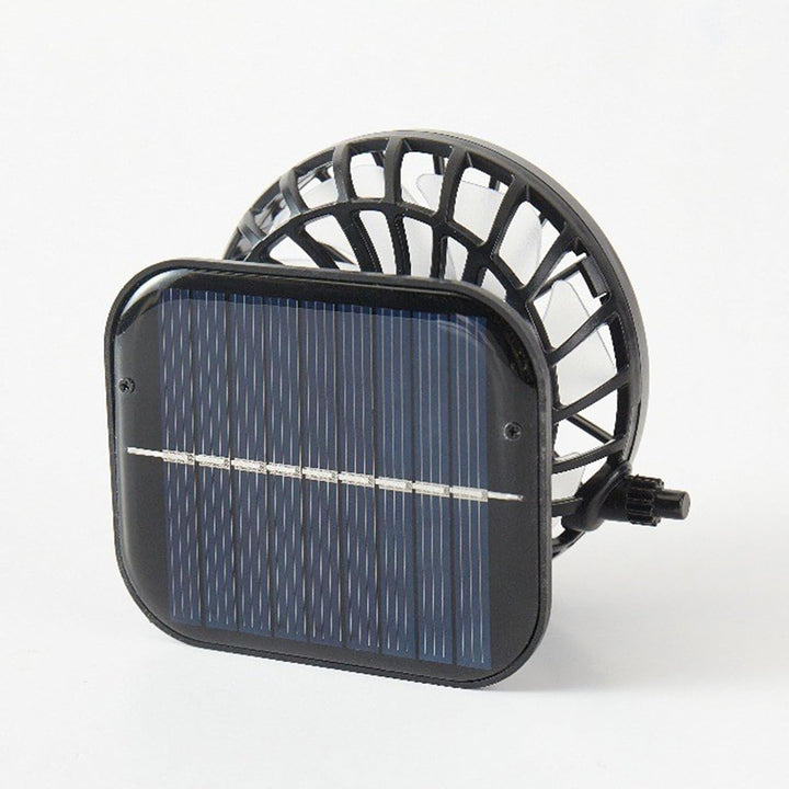 Close-up of the solar panel and fan on a grey cooling hat, designed for outdoor use.