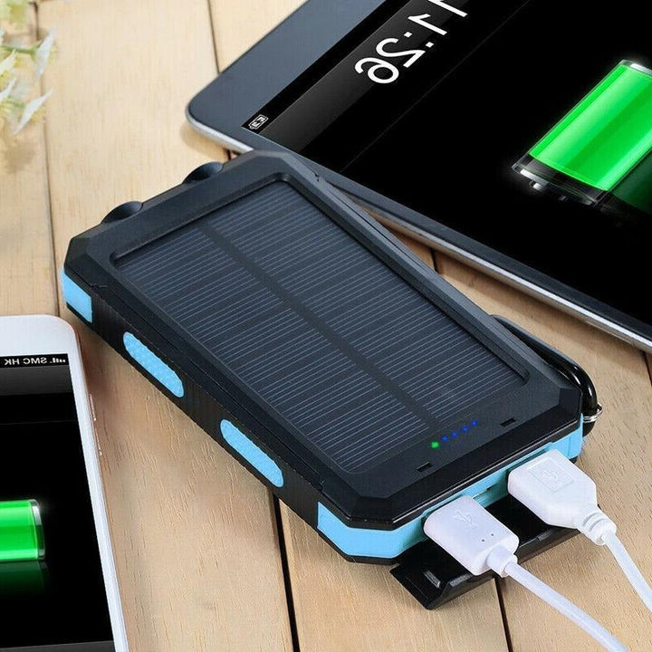 Waterproof solar power bank with dual USB ports, LED flashlight, perfect for outdoor emergencies.