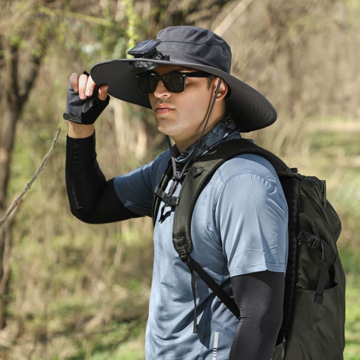 Unisex cooling fan hat with strong UV protection, shown in a vibrant green color.