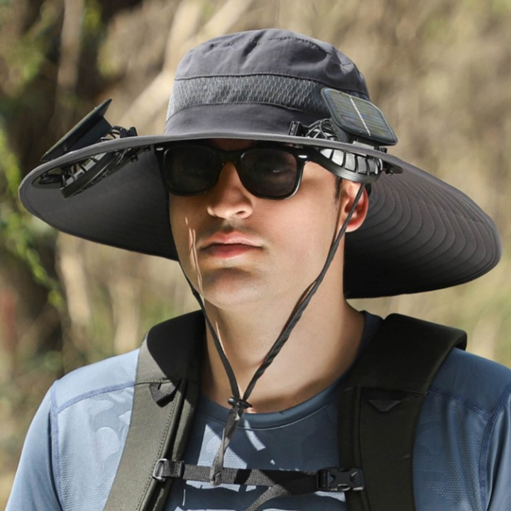 Side view of the adjustable solar fan hat, demonstrating its comfortable fit and sun visor.