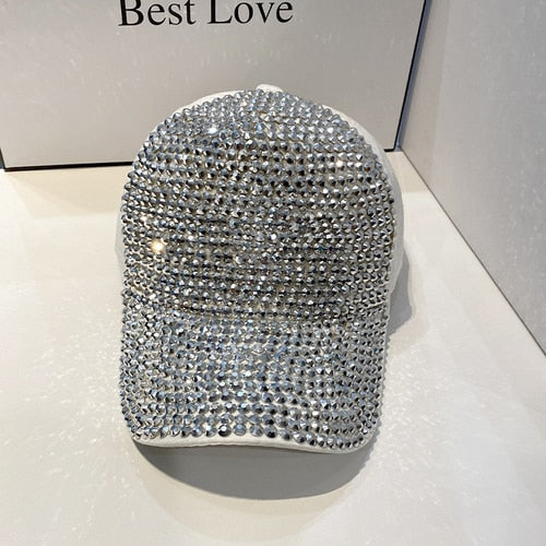 Close-up of a shimmering glitter hat, a trendy baseball cap that catches the light beautifully.