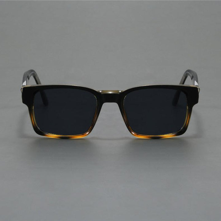 Fashionable square frame shades for unisex, featuring tortoise pattern & UV protection.