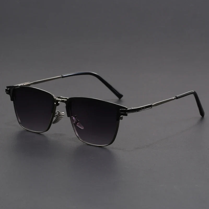 Contemporary unisex square sunglasses with metal accents. Modern fashion accessory offering essential UV eye protection.
