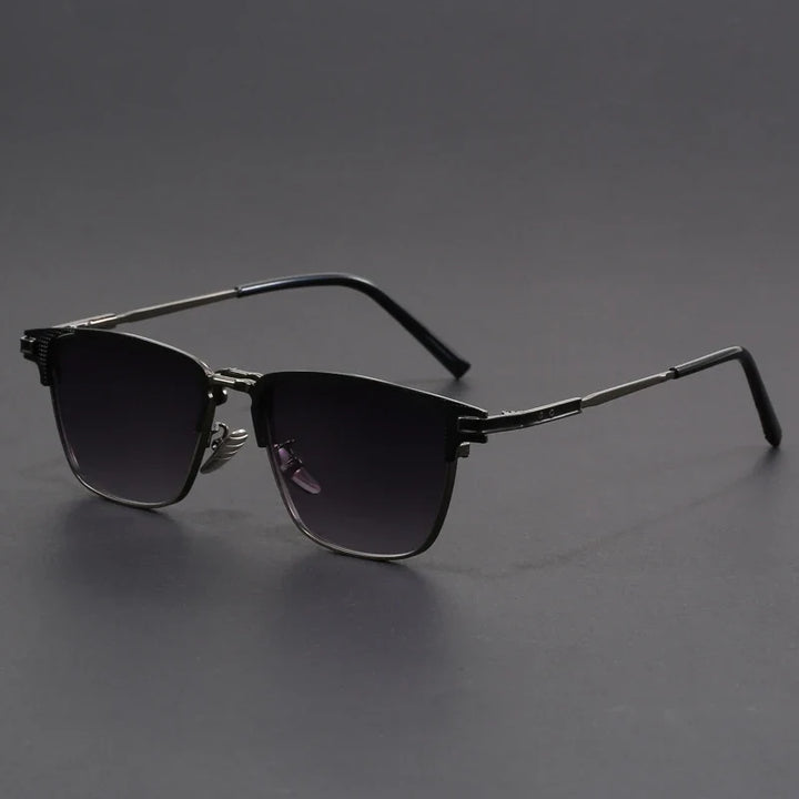 Contemporary unisex square sunglasses with metal accents. Modern fashion accessory offering essential UV eye protection.