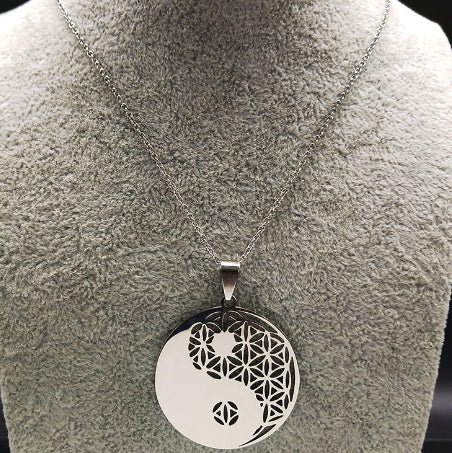 Stainless steel Life Flower pendant necklace. Intricate sacred geometry mandala design, a beautiful piece of spiritual jewelry.