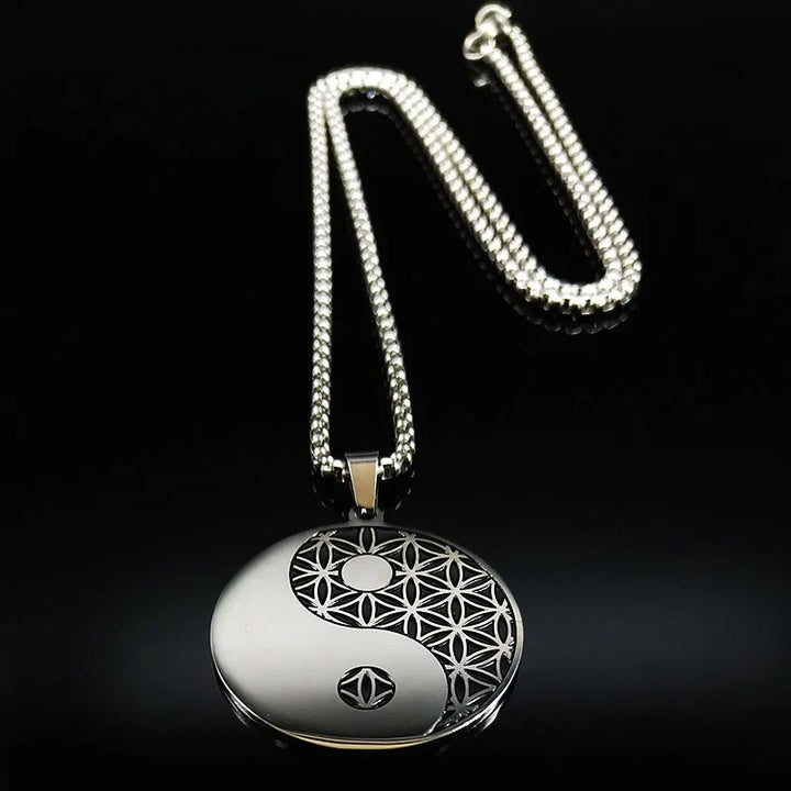 Elegant unisex stainless steel Life Flower pendant necklace with intricate sacred geometry mandala pattern. Stylish spiritual jewelry.