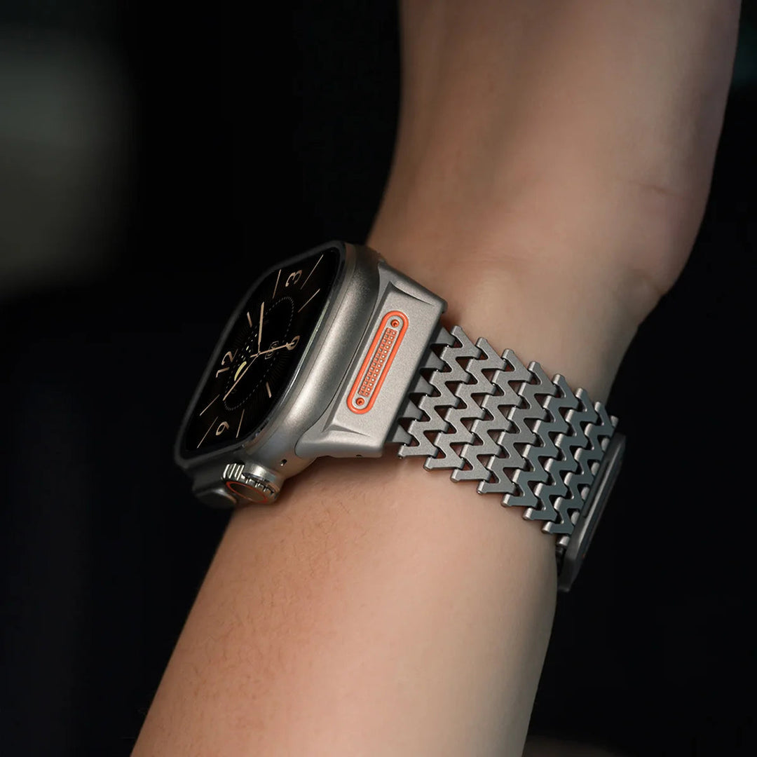 Silver magnetic watch band with secure link closure. Modern, durable stainless steel smartwatch accessory.