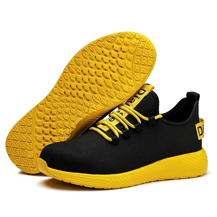 Unisex steel toe safety work shoes, providing breathable comfort, extreme durability, and impact resistance for workers.