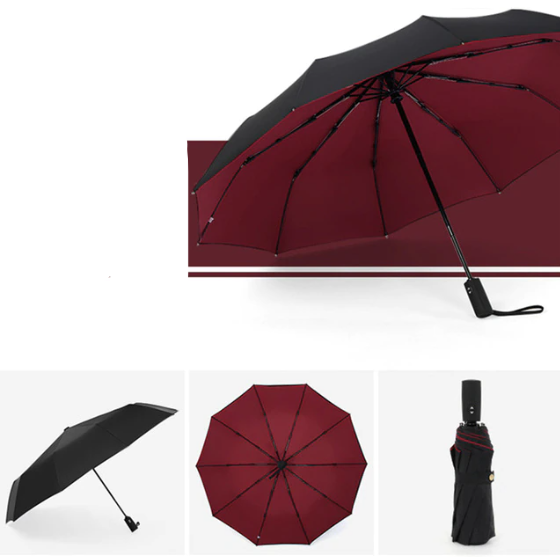 Compact storm-proof umbrella, shown next to a smartphone for scale, ideal for travel and rain protection