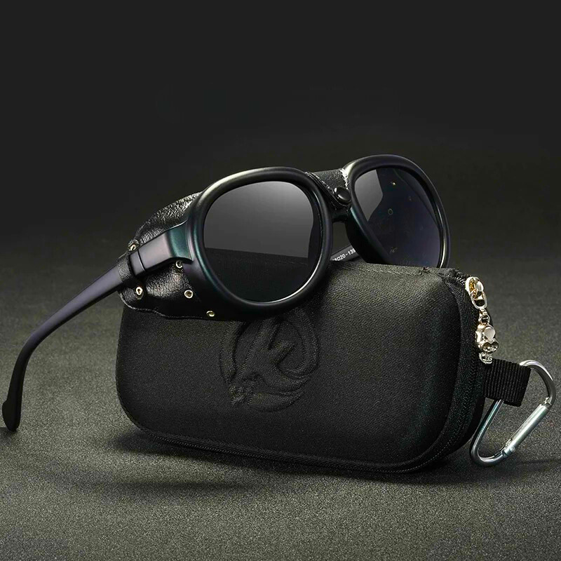 Unisex StormRider leather goggles, featuring rugged design and protective tinted lenses for all outdoor activities.