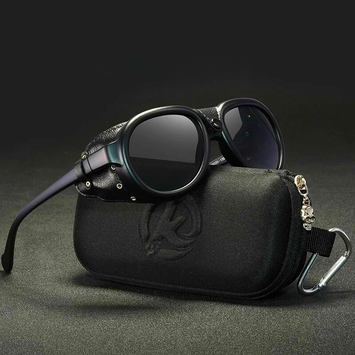 Unisex StormRider leather goggles, featuring rugged design and protective tinted lenses for all outdoor activities.