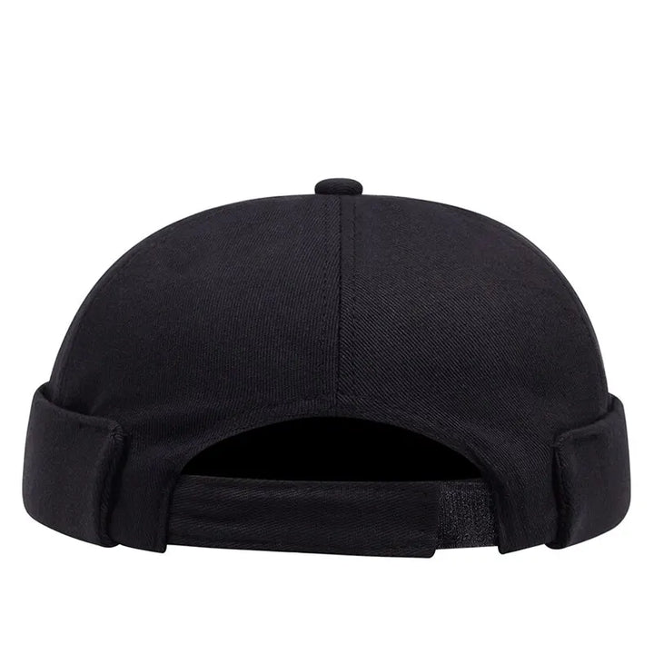 Person wearing a trendy unisex streetwear beanie with a cool shark design. Essential urban fashion hat.