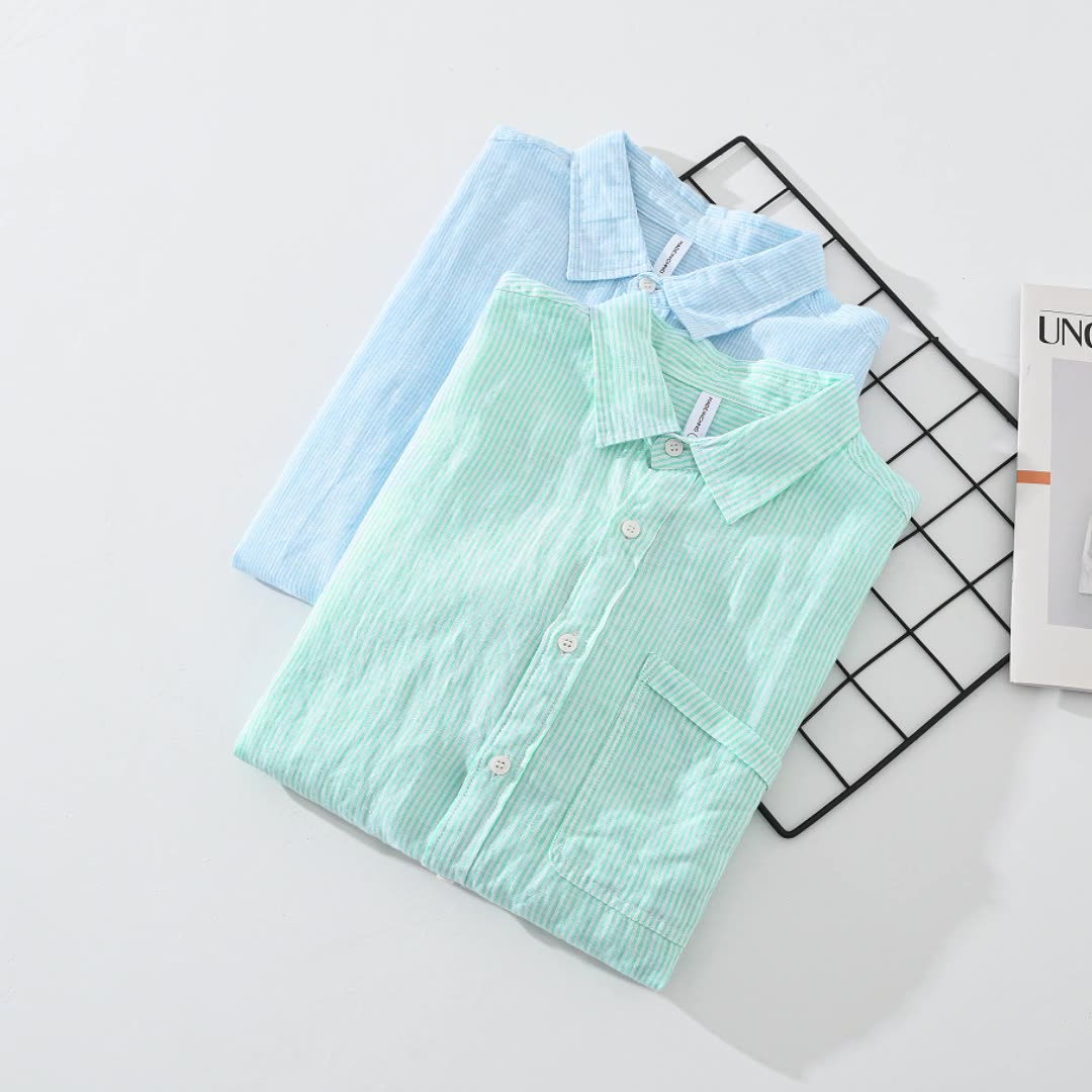 Effortless striped unisex shirt. Lightweight comfort, perfect for casual everyday wear. Textured button-down.