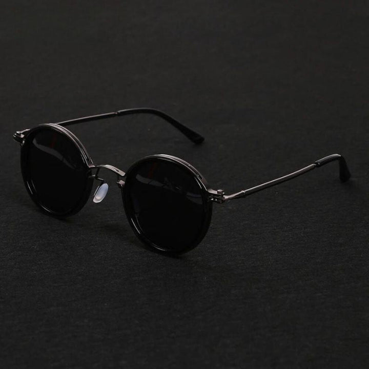 Sleek unisex sunglasses, combining polarized lenses with UV400 protection for stylish, functional eyewear.
