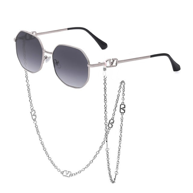 Classic round silhouette: unisex stylish UV400 sunglasses. Fashionable eyewear with alloy frame & robust lenses.