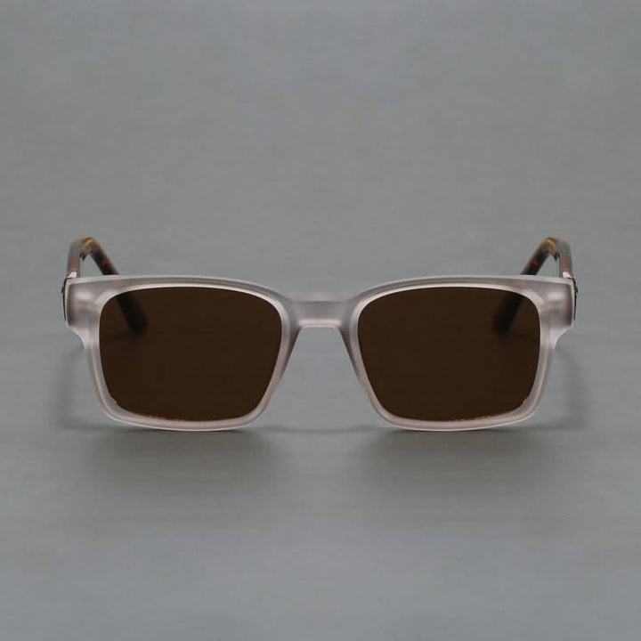 Retro polycarbonate square sunglasses, providing stylish UV and anti-glare protection.