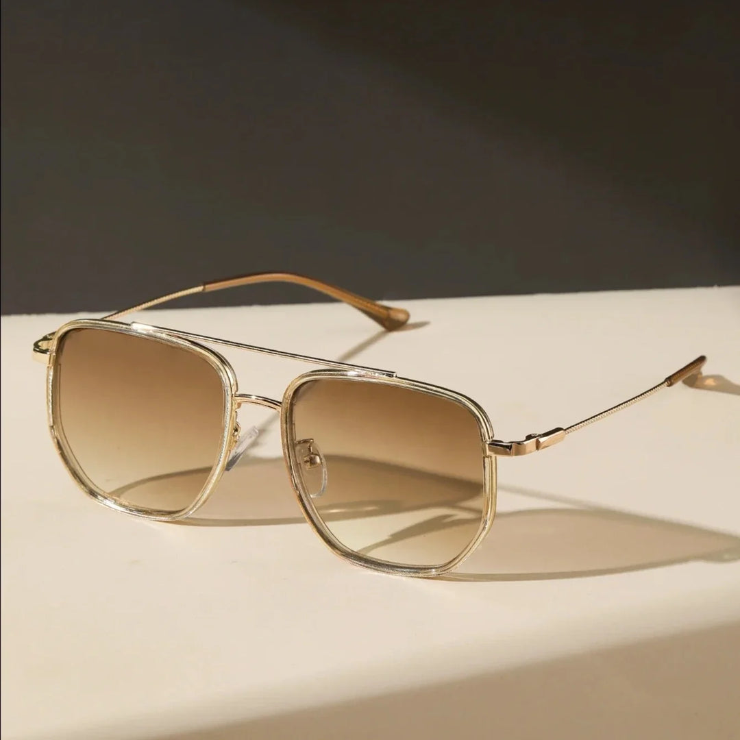 Modern design unisex sunglasses offering durable UV protection and style.