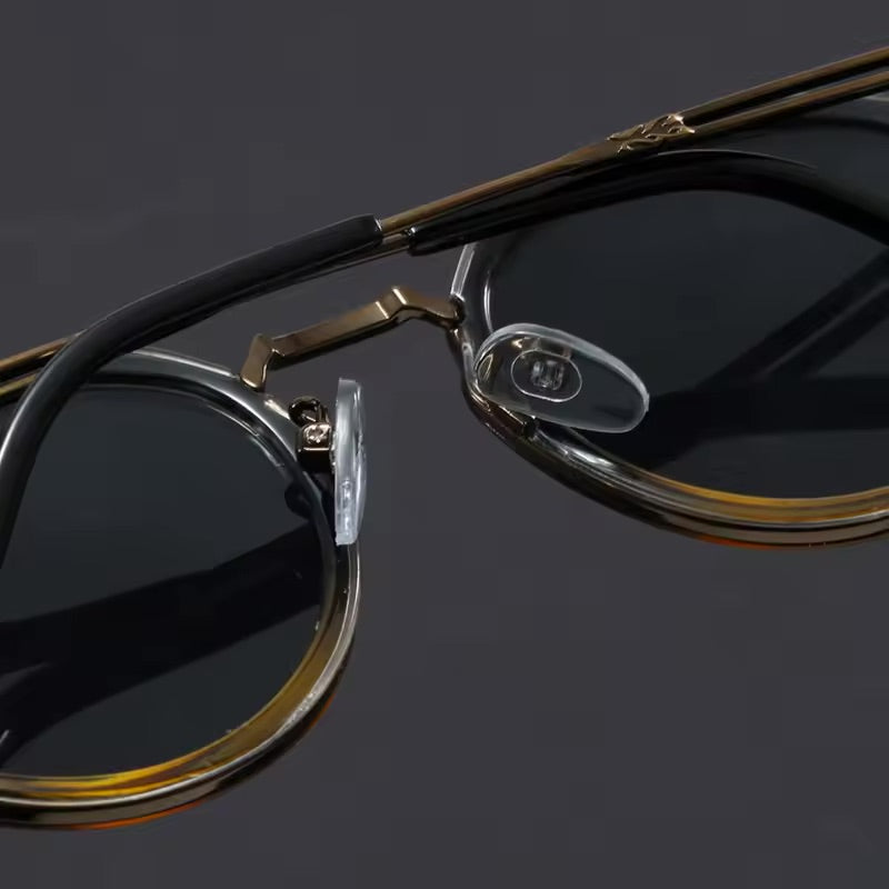 Blue tortoise metal frame sunglasses offering unisex UV protection. Fashionable anti-glare eyewear for daily use.