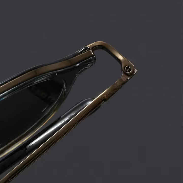 Classic black metal frame unisex sunglasses for UV protection. Stylish anti-glare shades, perfect everyday eyewear.