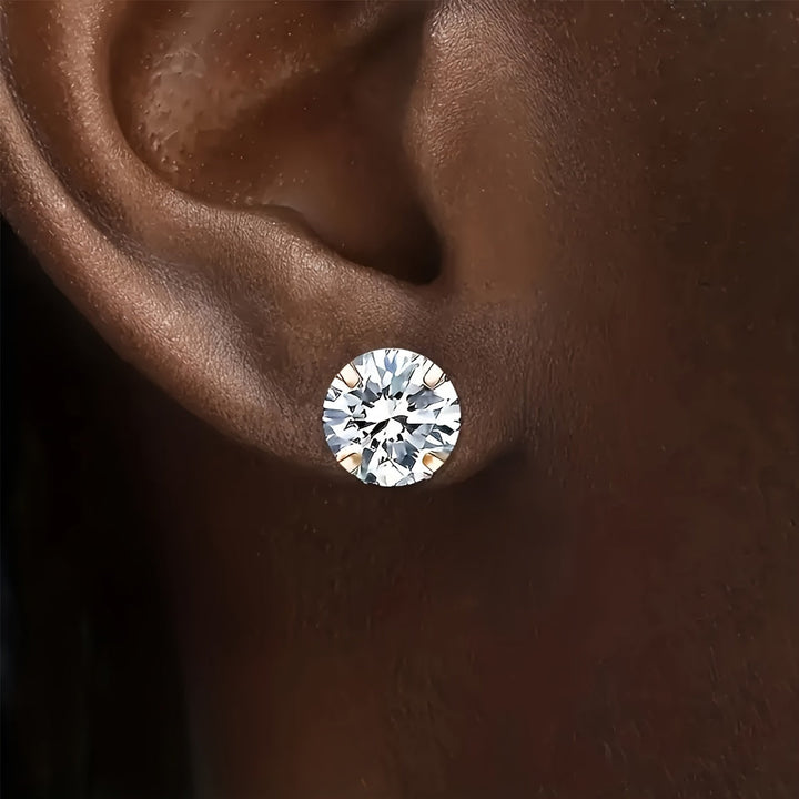 Silver-tone unisex stud earrings featuring sparkling zirconia, made from strong, hypoallergenic titanium steel for comfort.