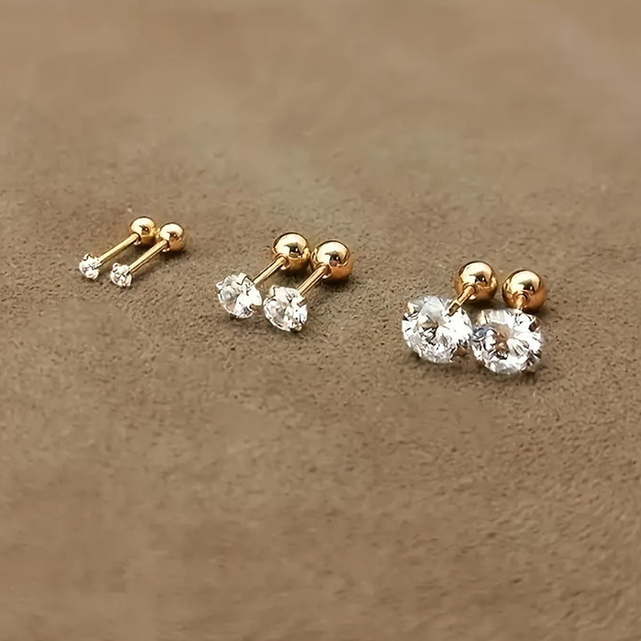 Model wearing elegant unisex titanium steel stud earrings with brilliant zirconia, ideal for minimalist style.