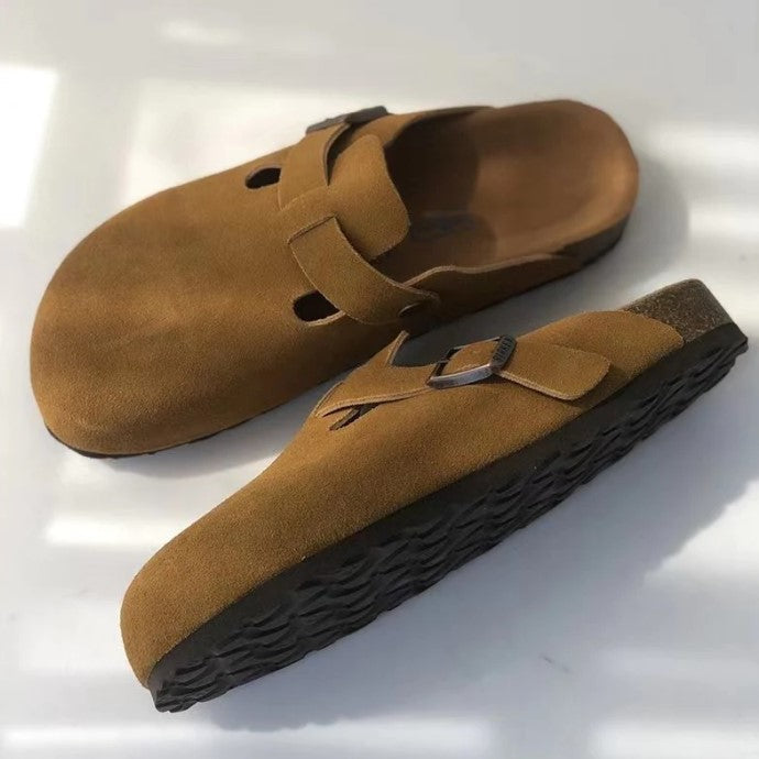 Premium suede slip-on shoes with an adjustable buckle, providing versatile unisex footwear.