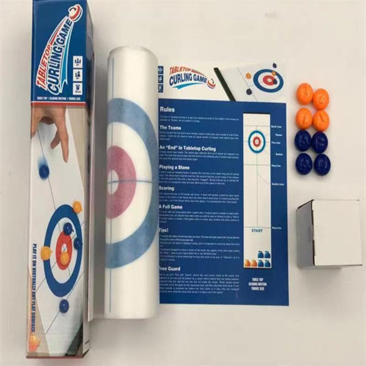 Kids and adults gathered around the Tabletop Curling mat, enjoying a competitive and fun indoor board game.
