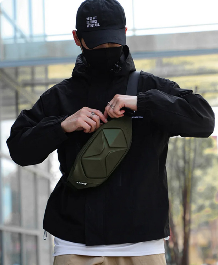 Unisex tactical hardshell crossbody sling bag, water resistant, anti-theft, durable urban carry.