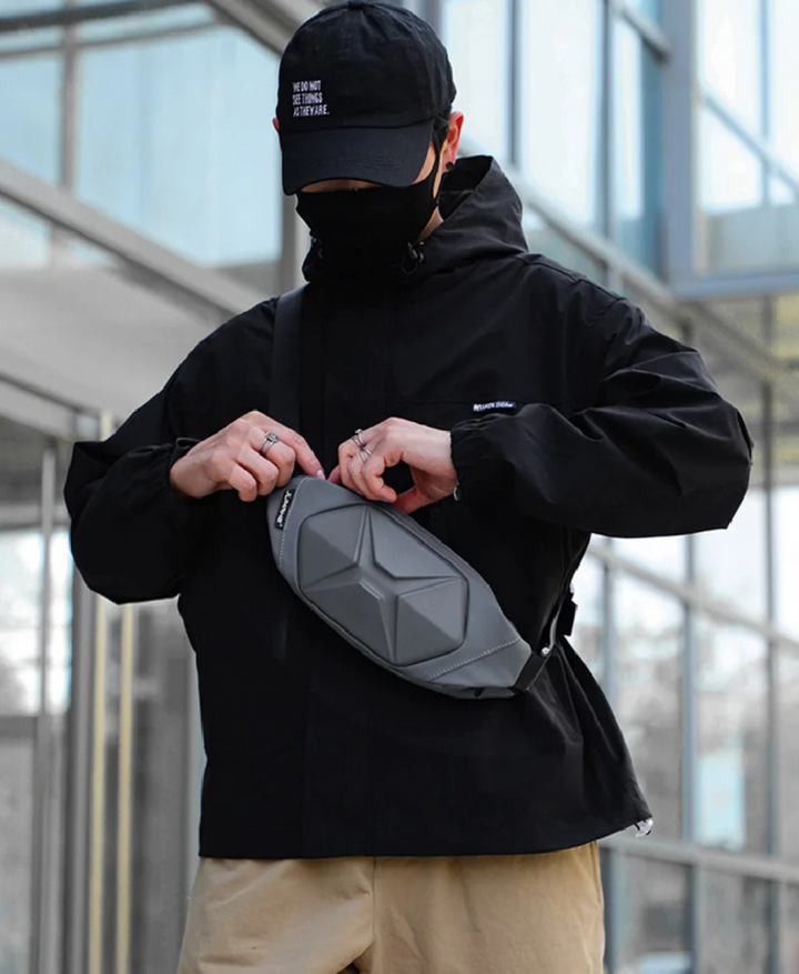 Modern unisex hardshell tactical sling bag, anti-theft, water resistant for versatile urban use.