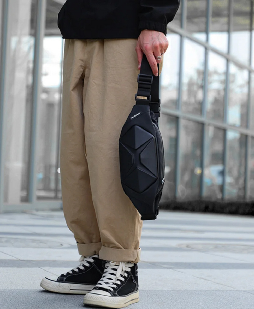 Rugged unisex tactical hardshell crossbody bag, water resistant & anti-theft for secure urban adventures.
