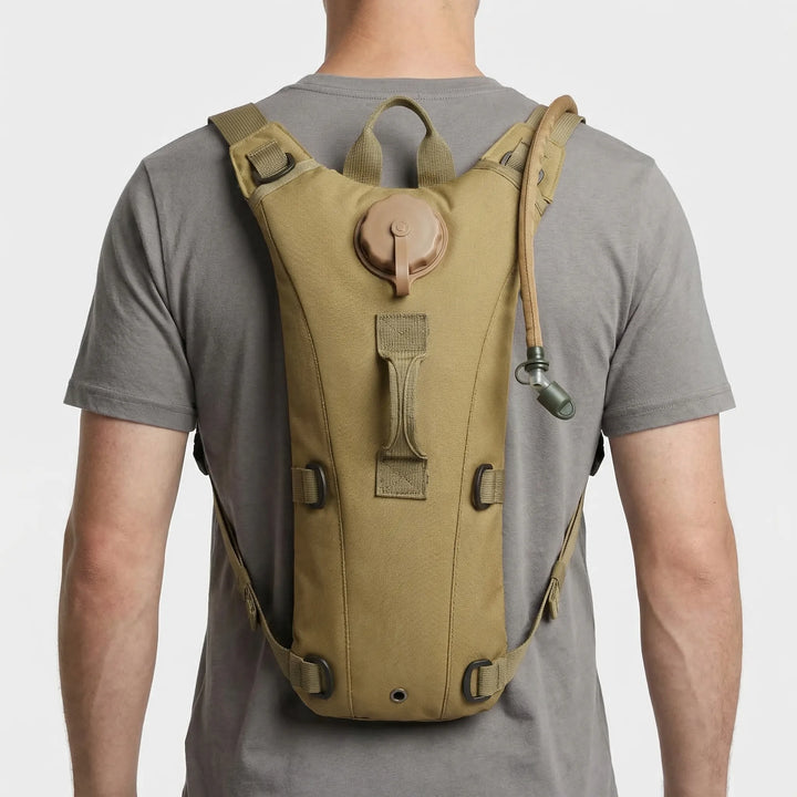 Black tactical hydration pack complete with a 3L water bladder, perfect for hiking, camping, and survival gear.
