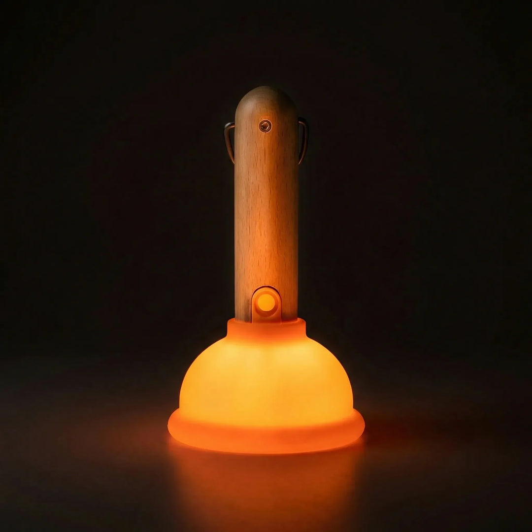 Plungeo LED table lamp with tactile plunger design, offering color-changing mood lighting