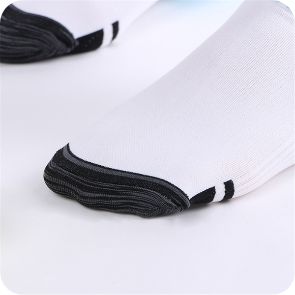 Therapeutic compression stockings for full leg support, promoting foot health and healthy circulation.