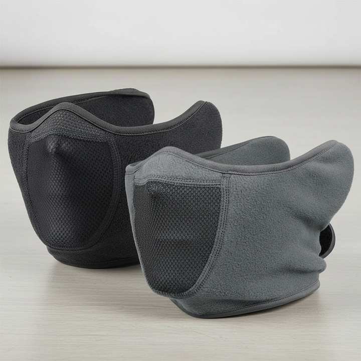 Model wearing black thermal face mask, fleece neck gaiter, ideal for winter sports