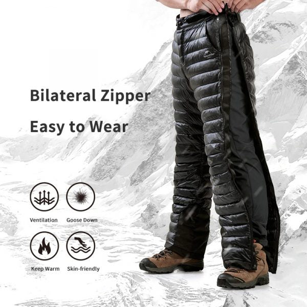 Warm goose down ski pants, insulated & zippered, offering comfort for snowboarding, winter sports & recreation.