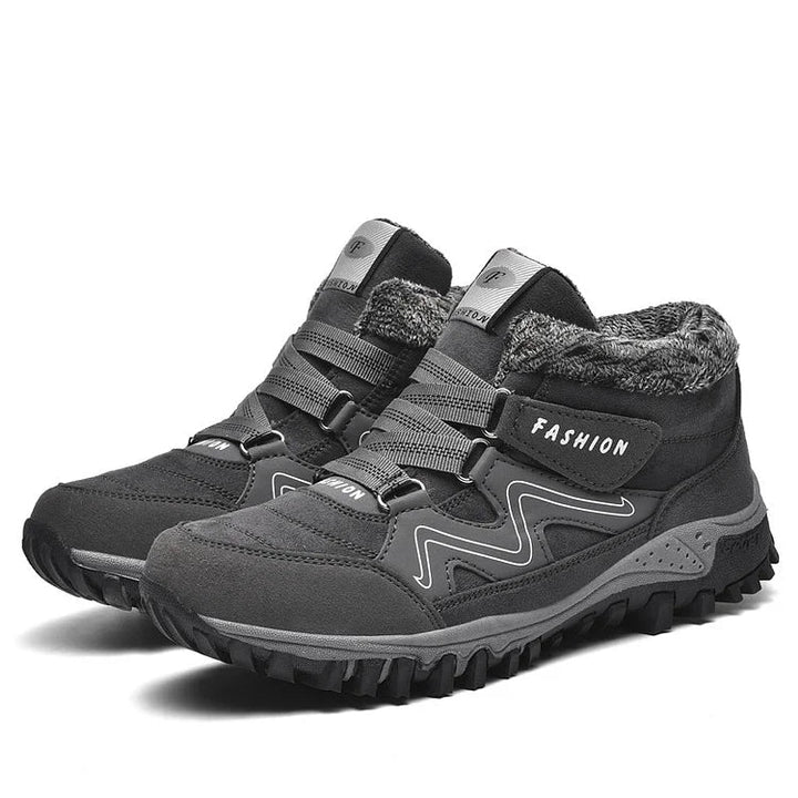 Unisex thermal hiking shoes, AlpineWarm, for winter warmth and comfort on cold weather trails.