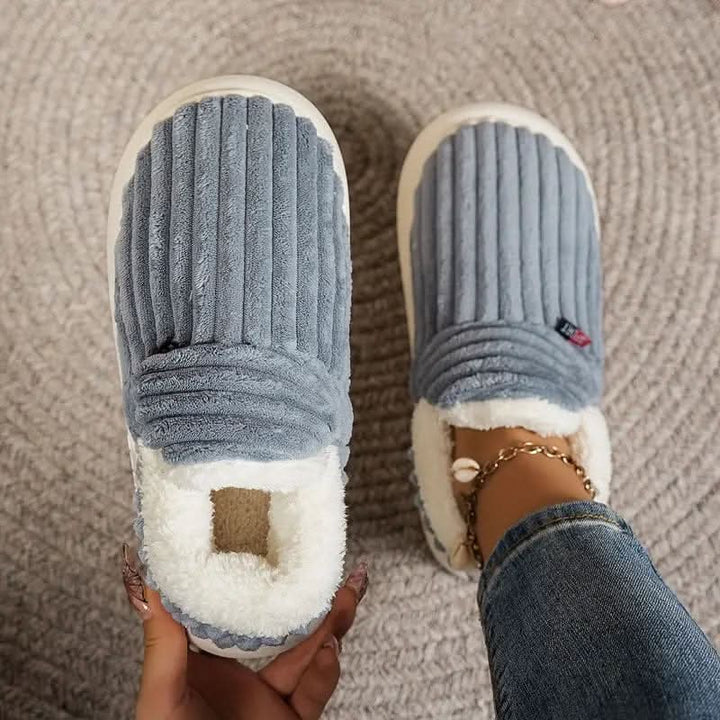 Luxurious thermal house slippers, providing plush unisex comfort and warmth for cold winter indoor days.