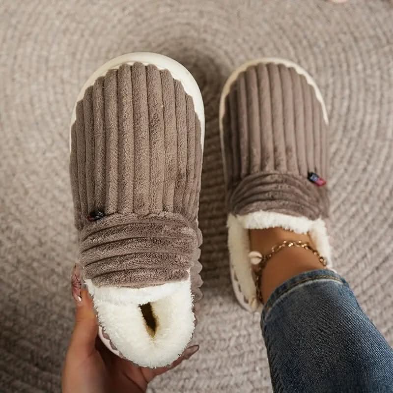 Essential thermal house slippers. Unisex design, cozy warmth, & non-slip safety for indoor winter comfort.