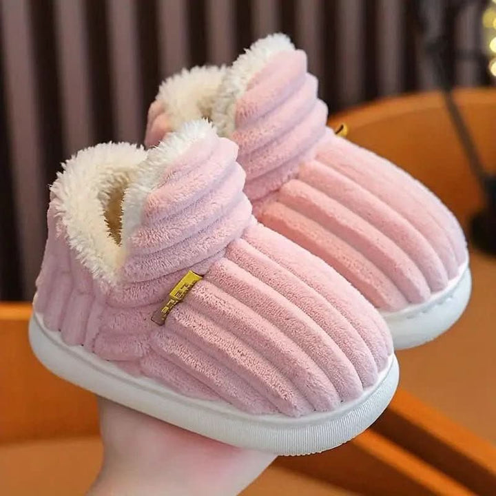 Fluffy thermal house slippers. Unisex indoor footwear offering cozy warmth and non-slip comfort for winter.