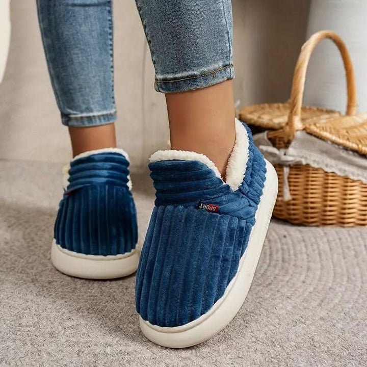 Snug unisex thermal house slippers, delivering ultimate warmth & comfort for winter indoor living. Easy care.