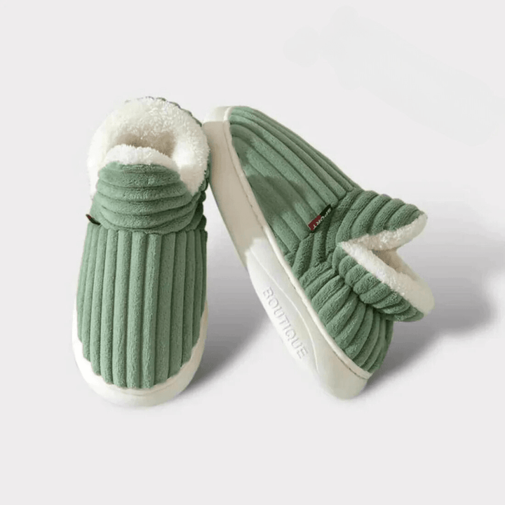 Stylish thermal house slippers, designed for cozy unisex winter comfort indoors. Warm and easy care footwear.